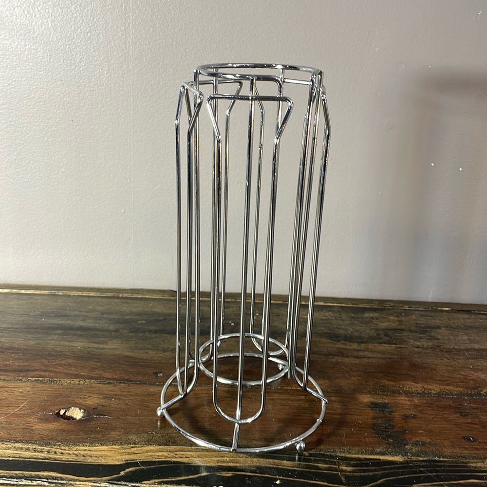 Metal storage display for Nespresso and compatible pods.  Holds many!